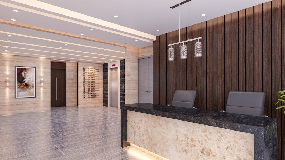 Bright modern office reception area with plants