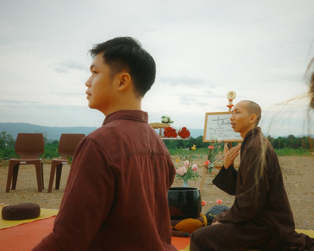 person meditating outdoors