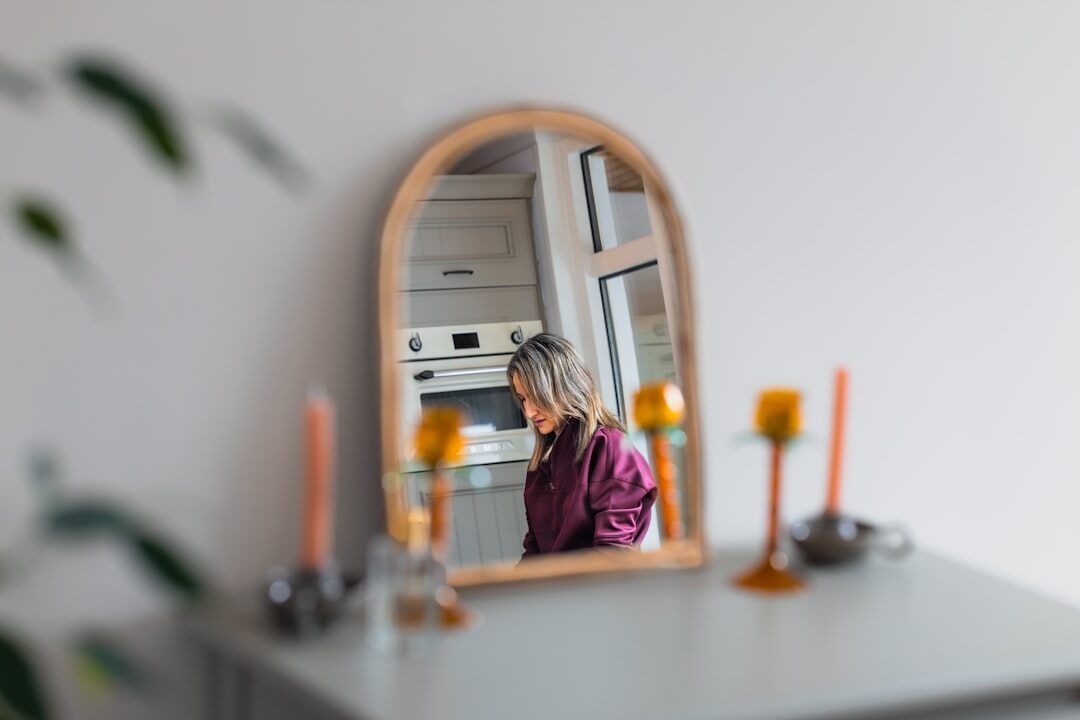 woman practicing speech in mirror