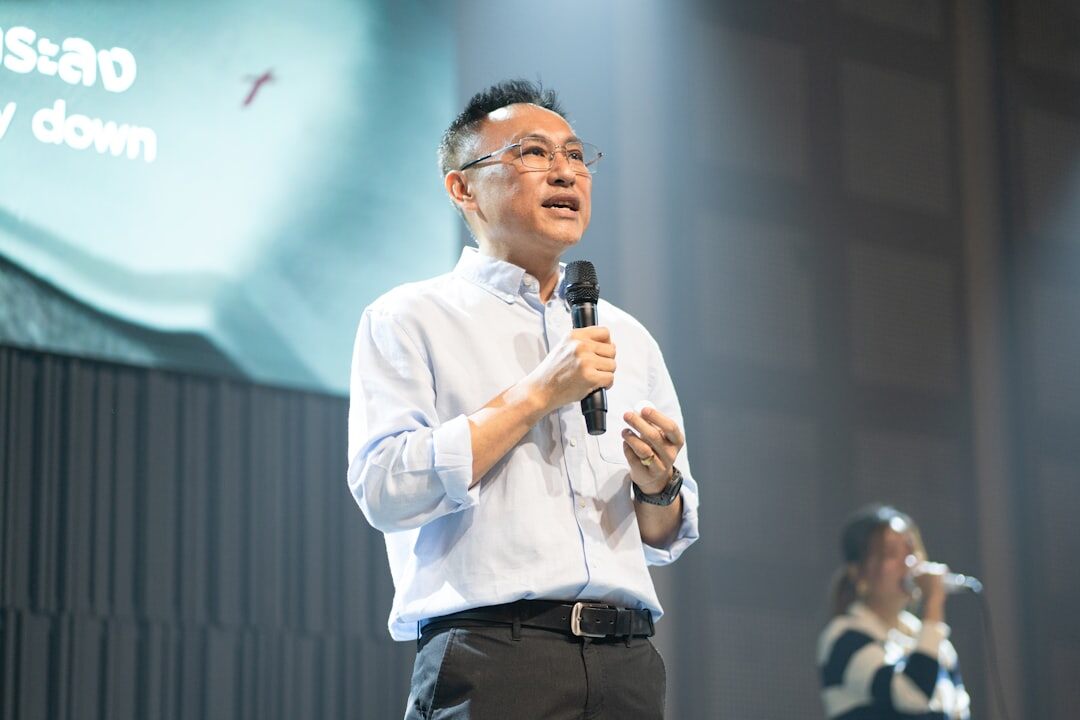 person speaking confidently on stage