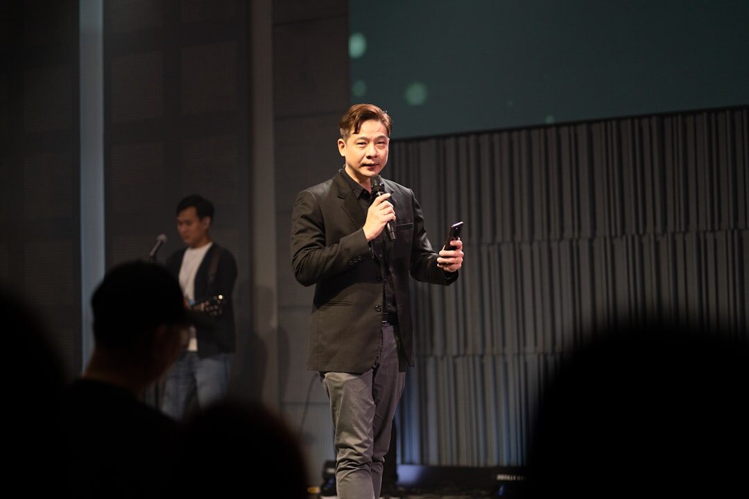 person speaking confidently on stage