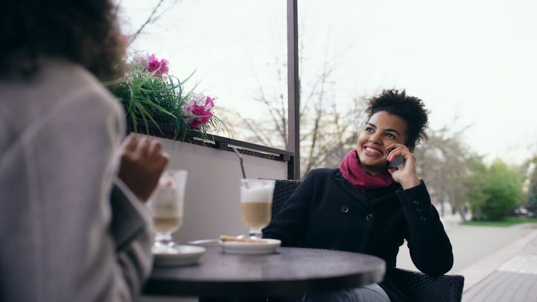 person smiling during conversation